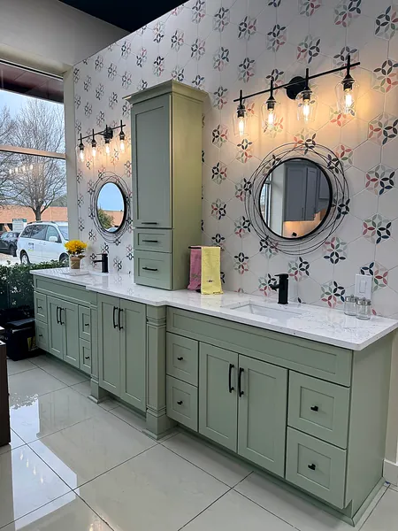 sage green double vanity with patterned wallpaper by WoodArt Cabinets San Antonio
